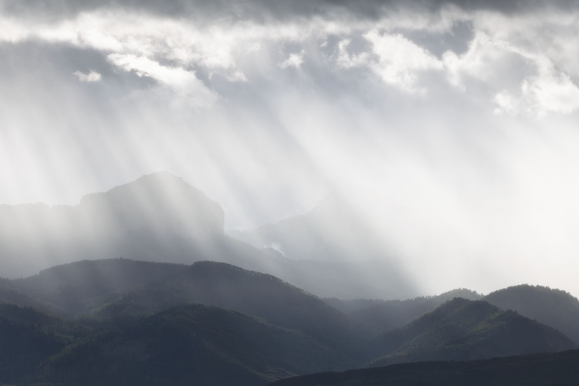 Sunbeams Over Courthouse Mountain Sunbeams shine down over Courthouse Mountain, which is part of the Cimarron Mountains in southwestern Colorado.